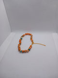 Bracelet perles naturelles orange et turquoise chaîne dorée ajustable